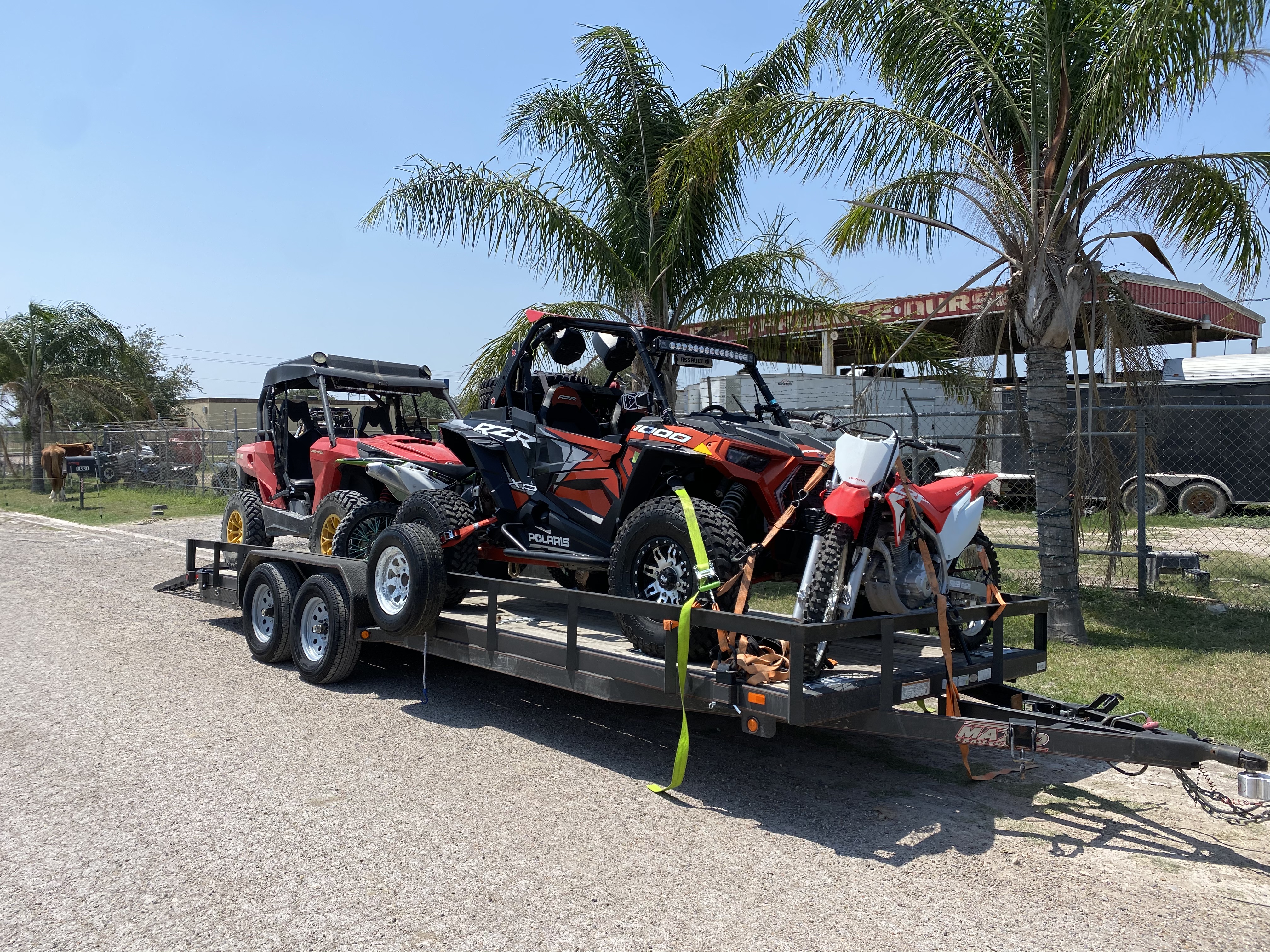 Side bby Side Units on a Trailer